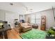 Comfortable bonus room with a sofa, desk, and decorative elements at 3526 Stockton Dr, Mount Pleasant, SC 29466