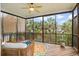 Relaxing screened porch with wicker seating and scenic views at 3526 Stockton Dr, Mount Pleasant, SC 29466