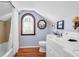 Attic bathroom featuring hardwood floors, a vanity, toilet, washer-dryer and a shower-tub combo at 41 Berkeley Rd, Charleston, SC 29407