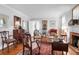 Elegant living room with hardwood floors, decorative fireplace, and comfortable seating at 41 Berkeley Rd, Charleston, SC 29407