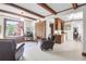 Cozy living room featuring beamed ceilings, tile flooring, and comfortable seating at 41 Berkeley Rd, Charleston, SC 29407