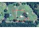 Aerial view showing property layout with home, land, and surrounding trees at 416 Jelly Rolls Rd, Moncks Corner, SC 29461