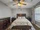 Cozy bedroom featuring a ceiling fan and wood furniture for a relaxing and comfortable ambiance at 416 Jelly Rolls Rd, Moncks Corner, SC 29461