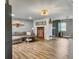 This living room features a fireplace, comfortable seating, wood plank flooring and an open concept design at 416 Jelly Rolls Rd, Moncks Corner, SC 29461