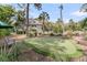 The backyard features a putting green and shrubbery at 418 Snowy Egret Ln, Kiawah Island, SC 29455