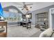This bedroom features a TV, gray carpet, a desk and a couch at 418 Snowy Egret Ln, Kiawah Island, SC 29455