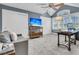 This bedroom features a TV, gray carpet, a desk and a couch at 418 Snowy Egret Ln, Kiawah Island, SC 29455