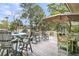 This deck features assorted furniture including rocking chairs and tables with an open view at 418 Snowy Egret Ln, Kiawah Island, SC 29455