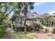 Charming multi-story home surrounded by lush landscaping, and a large deck for outdoor enjoyment at 418 Snowy Egret Ln, Kiawah Island, SC 29455