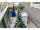 Efficient home generator, plants in decorative pots and metal railings on wooden deck at 418 Snowy Egret Ln, Kiawah Island, SC 29455