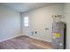 Basement with utility access door and modern AO Smith water heater at 4412 Garwood Dr, Ladson, SC 29456