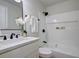 Updated bathroom features modern vanity, updated shower and tub with white subway tile at 4412 Garwood Dr, Ladson, SC 29456