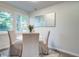 Cozy dining area features natural light, stylish decor, and comfortable seating for intimate meals at 4412 Garwood Dr, Ladson, SC 29456