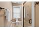 Bathroom with walk-in shower and a window for natural light at 4952 Steeplechase Ln, Hollywood, SC 29449