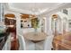 Dining room with modern chandelier, adjacent kitchen, and views to the living room at 4952 Steeplechase Ln, Hollywood, SC 29449