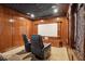 Cozy theater room featuring leather recliners and a projection screen at 4952 Steeplechase Ln, Hollywood, SC 29449