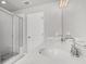 Bathroom featuring double vanity with quartz countertop, glass shower door, and modern fixtures at 5114 Double Eagle Loop, Summerville, SC 29485