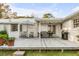 Backyard with deck, lounge seating, an umbrella, and a grill at 561 Seaward Dr, Charleston, SC 29412