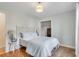 Comfortable bedroom with decorative headboard, bedside table, and closet at 561 Seaward Dr, Charleston, SC 29412