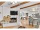 Bright living room with a cozy fireplace and seamless flow to the kitchen, great for entertaining guests at 561 Seaward Dr, Charleston, SC 29412
