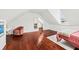 Bedroom with wood floors, vaulted ceilings, and adjacent sitting area at 66 Warren St # Main House Only, Charleston, SC 29403