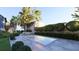 Beautiful in-ground pool with an elegant patio, manicured landscaping, and privacy fence at 66 Warren St # Main House Only, Charleston, SC 29403
