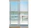 Expansive view of the harbor, yachts, and boats from the balcony overlooking tranquil water at 68 W 9Th St # B, Folly Beach, SC 29439