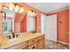 Spacious bathroom with double sinks and traditional-style fixtures at 68 W 9Th St # B, Folly Beach, SC 29439
