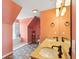 A well-lit bathroom with double sinks, a window seat, and neutral-toned tiles at 68 W 9Th St # B, Folly Beach, SC 29439