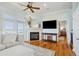 Bright and airy living room with fireplace, offering views of the marina at 68 W 9Th St # B, Folly Beach, SC 29439