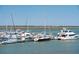 Waterfront marina view with numerous boats and yachts docked on a beautiful sunny day at 68 W 9Th St # B, Folly Beach, SC 29439