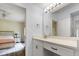 Bright bathroom featuring a sleek vanity and a doorway leading to the bedroom at 700 Daniel Ellis Dr # 3208, Charleston, SC 29412