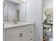 Clean bathroom featuring a white vanity with modern fixtures and a view to an adjacent room at 700 Daniel Ellis Dr # 3208, Charleston, SC 29412