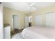 Comfortable bedroom featuring a ceiling fan, closet doors, and neutral-toned walls at 700 Daniel Ellis Dr # 3208, Charleston, SC 29412