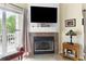 Close-up of the fireplace with decorative mantle and bench in the living room at 700 Daniel Ellis Dr # 3208, Charleston, SC 29412