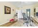 Home office with a neutral palette, with a cat tower and access to other rooms at 700 Daniel Ellis Dr # 3208, Charleston, SC 29412