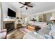 Cozy living room with fireplace, open to dining area and kitchen, creating a spacious feel at 700 Daniel Ellis Dr # 3208, Charleston, SC 29412