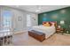 Well-lit bedroom with ample natural light and neutral carpet at 8363 Water Ash Way, North Charleston, SC 29420