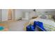 Versatile bonus room featuring a comfortable bed and ample open space for flexible use at 8363 Water Ash Way, North Charleston, SC 29420