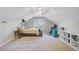Spacious bonus room featuring natural light and offering space for sleeping and a workspace at 8363 Water Ash Way, North Charleston, SC 29420