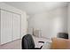 This bedroom features closet space and a work desk at 8956 N Red Maple Cir, Summerville, SC 29485