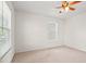 Bright bedroom features a ceiling fan and sun-filled windows at 8956 N Red Maple Cir, Summerville, SC 29485