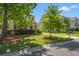 Beautiful two-story house with a well-maintained lawn and a tree-lined street at 8956 N Red Maple Cir, Summerville, SC 29485