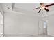 Bright main bedroom with a ceiling fan and neutral carpeting at 8956 N Red Maple Cir, Summerville, SC 29485