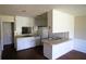 Bright kitchen features white cabinetry, granite countertops, and modern appliances at 95 Logan Dr, Summerville, SC 29483
