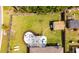 Aerial view showcases the patio, fenced yard, landscaping, and shed in the backyard at 9781 Roseberry St, Ladson, SC 29456