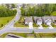 This aerial view showcases the home, landscaping, and the surrounding neighborhood at 9781 Roseberry St, Ladson, SC 29456