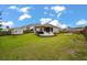 This backyard features a pergola, outdoor kitchen, and a seating area perfect for entertaining at 9781 Roseberry St, Ladson, SC 29456