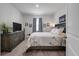 Comfortable bedroom featuring a queen-sized bed, dark wood furniture, and a peaceful ambiance at 9781 Roseberry St, Ladson, SC 29456