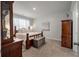 A spacious bedroom with neutral walls, plush carpet, and plenty of natural light for a calming retreat at 9781 Roseberry St, Ladson, SC 29456